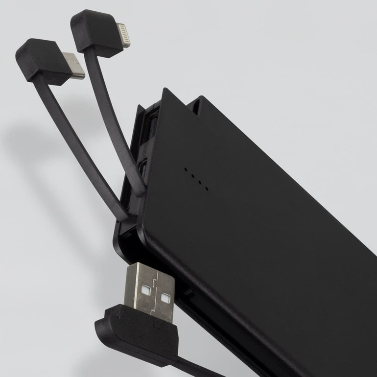 A portable black power bank with integrated charging cables for devices. It features a logo on the surface.