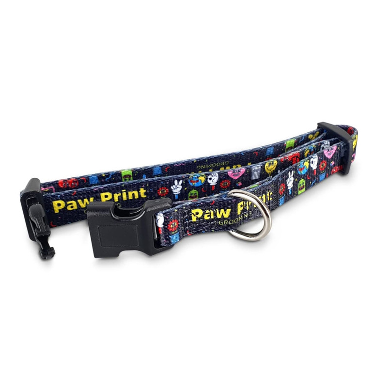 A dog collar featuring a colourful design with various paw prints, adjustable strap, and a clip buckle.