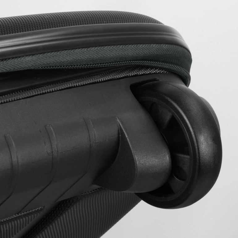 A black wheeled suitcase with a green zipper and a visible wheel assembly. The texture is detailed and sleek.