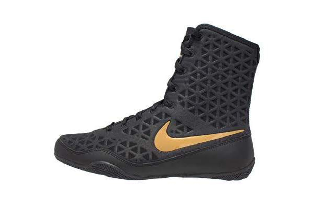 nike black gold boots