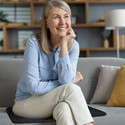 Female model sitting on Seat Cover.