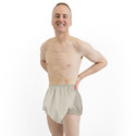 Male model wearing Incontrol Diapers Nighttime Rubber Pants for incontinence