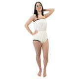 Front of the Latex incontinence romper on a female model with models hands up