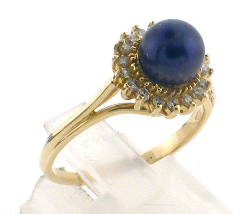 14 karat yellow gold Black Pearl (6.7mm) and diamond ring weighing 3.4 grams.  Diamond weigh approx .20ct.  Finger size 8.25