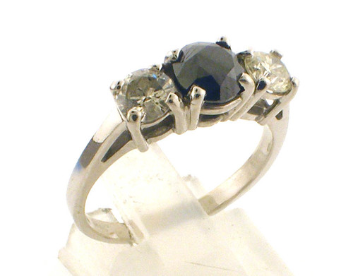 14 karat white gold sapphire and diamond ring weighing 3.7 grams.  Diamonds weigh a total of approx .66 ct tw  (J-L, I1-2). Saph is 6.25mm.  Finger size 8.5