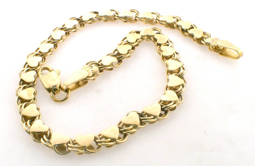 14 karat yellow gold silk rope bracelet weighing 6.6 grams.  7 inches in length