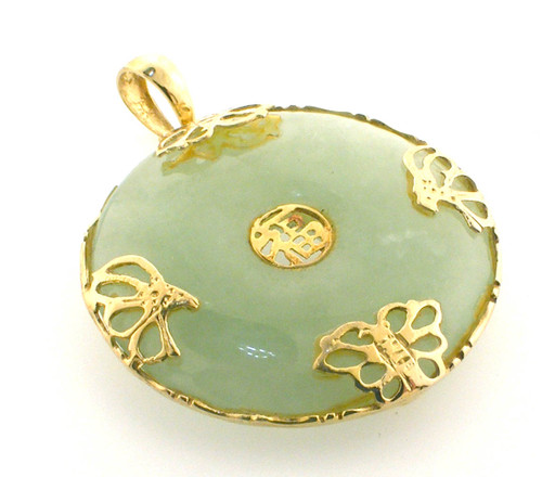 14 karat yellow gold Jade pendant 14 karat yellow gold Jade pendant