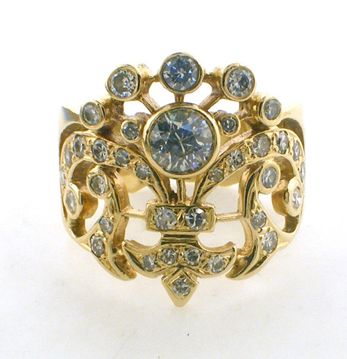14 karat yellow gold diamond ring weighing 9.4 grams.  Ctr diamond ~ .50 ct tw