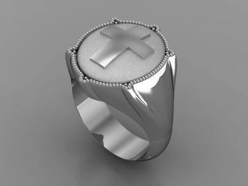 This is a smaller ring with a cross on it and plainer sides.  Weight in 14 karat yellow gold is 25 grams.