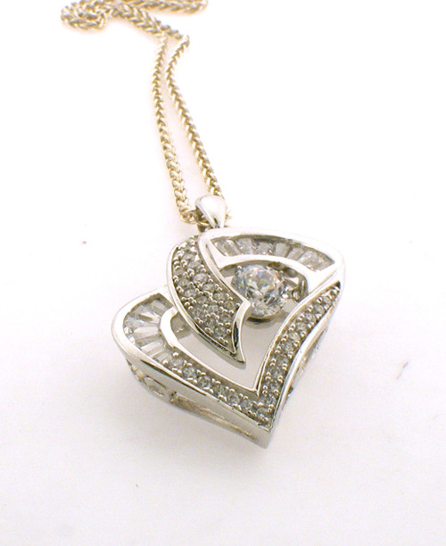 Sterling silver and CZ heart necklace. The total weight of the necklace is 4.4 grams and the total length of the chain is 18 inches.