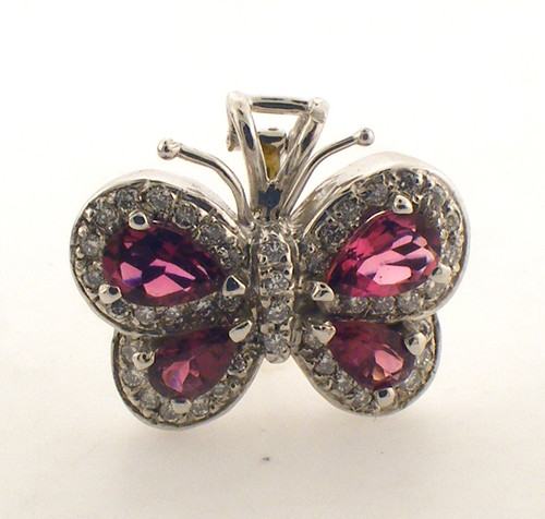 14 Karat white gold Diamond and ruby butterfly pendant. The Diamond TW is .25ct and the total weight of the pendant is 5 grams.