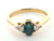 14 karat yellow gold emerald and diamond ring weighing 2.4 grams.  D~.20ct tw. sz 5.5