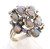 14 karat yellow gold opal and diamond ring weighing 8.8 grams.  Diamond weigh a total of approx .30ct.  Finger size 7.75.