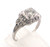 18 Karat white gold vintage diamond ring weighing 2.1 grams. Finger size 7 3/4.  side diamond approx .12ct tw. Center diamond approx .50ct I-J, VS