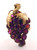 14 karat yellow gold ruby grape ring weighing 7.5 grams. Finger size 6