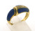 18 karat yellow gold lapis and diamond ring weighing 5.3 grams.  Size 7.75,  Diamonds weigh approx .10ct tw