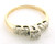 14Karat two tone yellow gold with white gold top. Weighing 2.8 grams. Diamonds weighs apprx .10ct tw. Finger size is 7