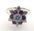 14 karat white gold diamond and ruby ring weighing 4.4 grams. Finger size 8.  Diamonds weigh approx 1.0 carat