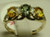 10 karat yellow gold green and yellow sapphire ring weighing 2.7 grams, Finger size 8.25