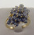 This is a 14 karat yellow gold ring with a topaz cluster. The topaz total weight 1.25ct and he total weight of the ring is 4.9 grams. The ring was made for a finger size of 8.5