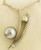 14 karat white gold custom made tahitian pearl and diamond necklace weighing 15.0 grams.  (chian sold separately). Diamond weighs .14 ct.  Pearl is 11.3 mm