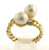 18 karat yellow gold pearl and diamond ring weighing 9.2 grams. Pearls are 8.0 mm Diamond ~.12ct Tw. Size 9.5