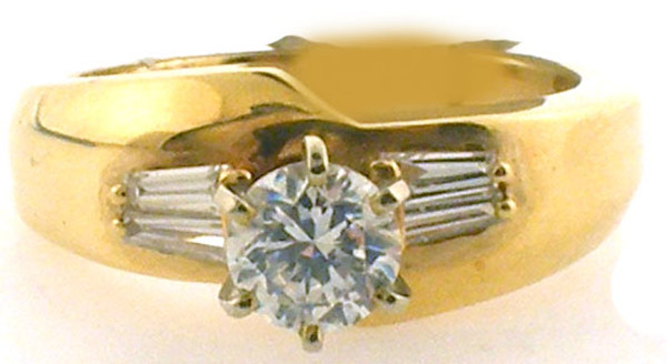 14 karat yellow gold diamond remount ring.  Ring contains .24 carats total weight