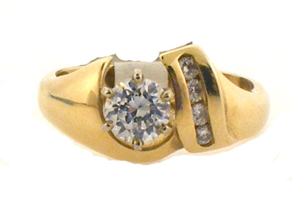 14k yellow gold remount ring with cubic zirconia center. diamonds weight .09 ct tw.