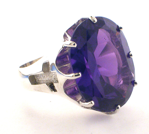 20 x 15 mm Amethyst (simlutated or Genuine) or Simulated Ruby Available.  Weighs 17.0 grams in sterling silver.  Approx 21.5 grams in 14 karat