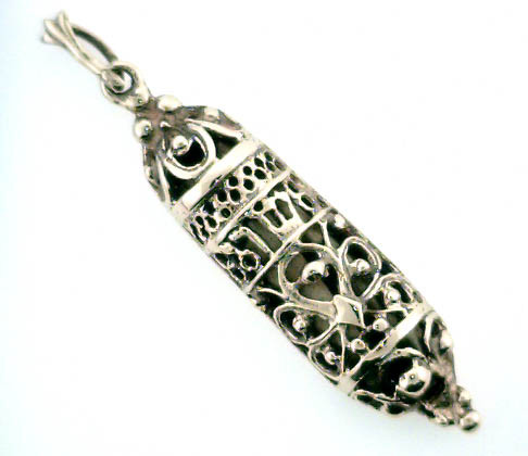 14 karat yellow gold Mezuzah with paper weighing 4.1 grams