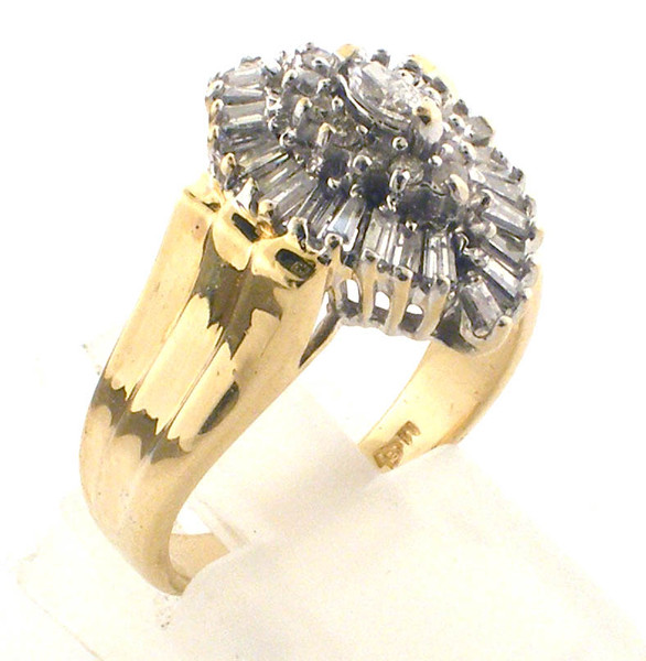 14 karat yellow gold diamond cluster ring weighing 5.4 grams.  Diamonds weigh a total of approx .50 ct.  Finger size 7
