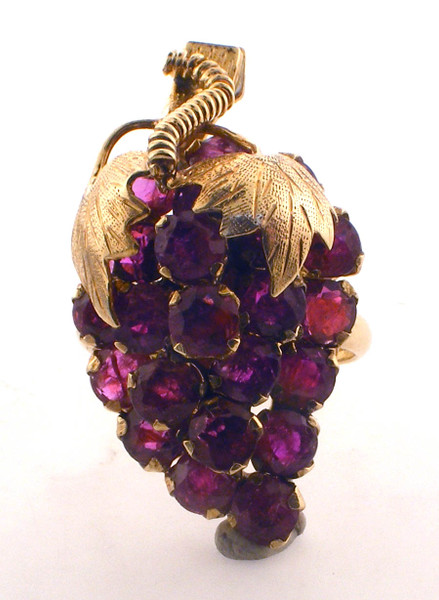 14 karat yellow gold ruby grape ring weighing 7.5 grams. Finger size 6