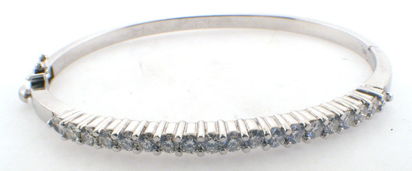 14 karat white gold diamond bangle bracelet weighing 17.1 grams.  Diamonds weigh a total of approx 2.0 carats.