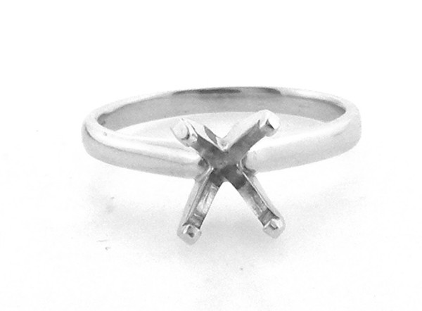 14 karat white gold solitaire engagement ring weighing 2.3 grams. Finger size 5.25