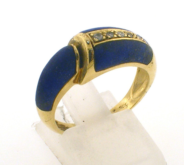 18 karat yellow gold lapis and diamond ring weighing 5.3 grams.  Size 7.75,  Diamonds weigh approx .10ct tw