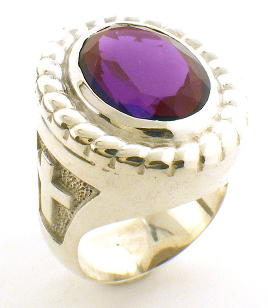This is the smaller version of the BR102.  It has a 16 x 12 Amethyst center and weighs 31 grams in 14 karat gold.