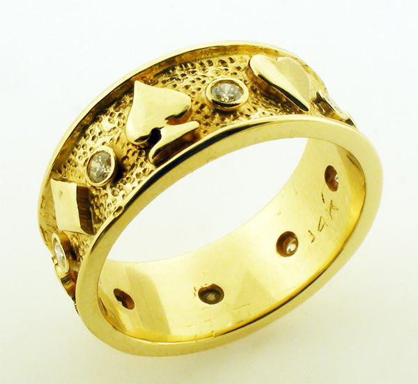 14 Karat yellow gold ring with Diamonds. The Dia TW is 0.25 ct. Dia Color: G-I and clarity: SI. The weight of the ring is 7.7 grams