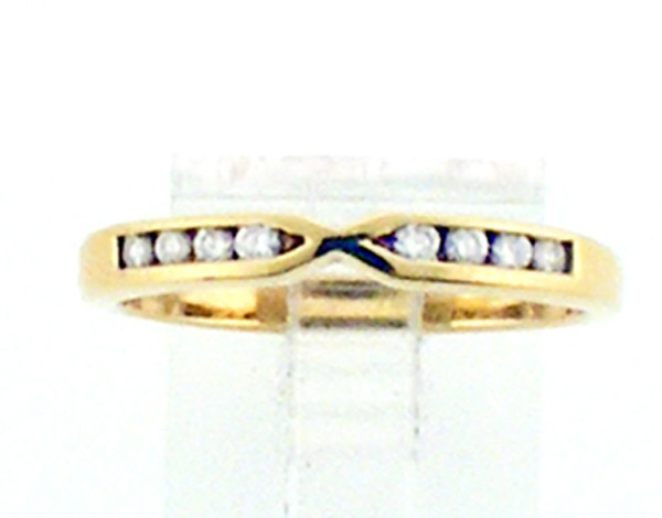 14 karat yellow gold diamond wedding band weighing 1.9 grams, Finger Size 5.5. Diamond weight is approx .12ct tw
