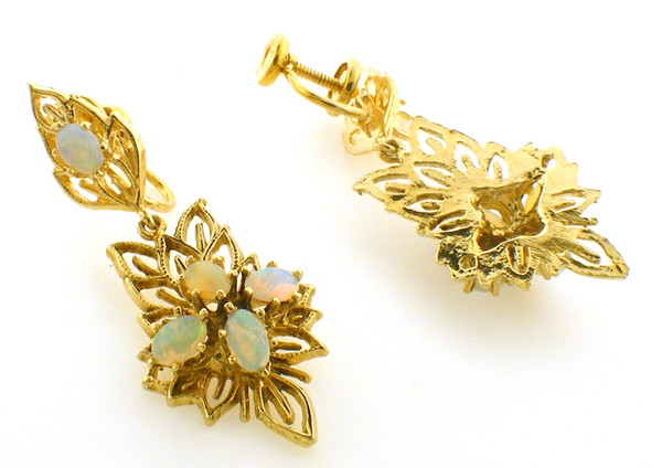 14 karat yellow gold opal dangle earrings weighing 5.9 grams. Earrings have non pierced french backs