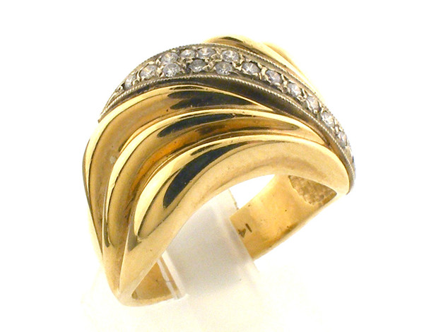 14 karat yellow gold diamond ring. The ring size is a 6.5. The Diamond total weight is .15ct. Weight is 8.6 grams.  Original sale price $995  - 40% = $597
