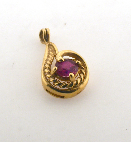 14 karat yellow gold ruby pendant. Original price $140 - 40% = $84