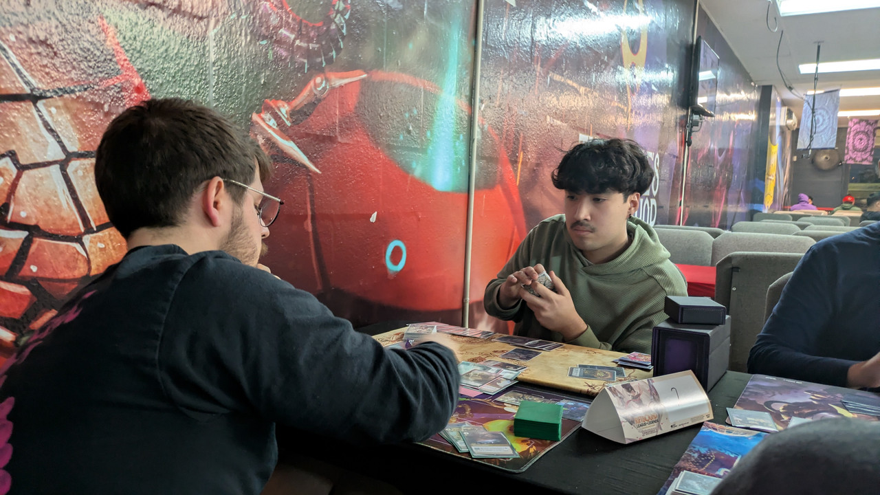 Close-up Riftbound match gameplay at The People’s Card Shop Las Vegas