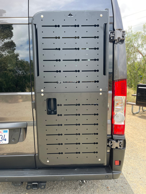 Dodge RAM Promaster with an Aluminess rear door Base Unit Mount and BackPACK Mounting Plate.