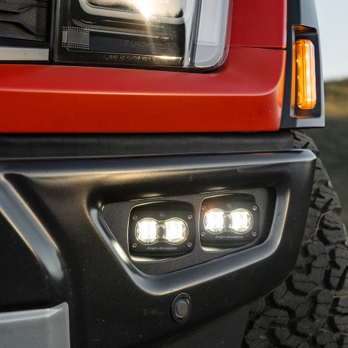 Close-up installation of Ford Raptor 2021-on S2 SAE Dual Fog Pocket Light Kit | Baja Designs
