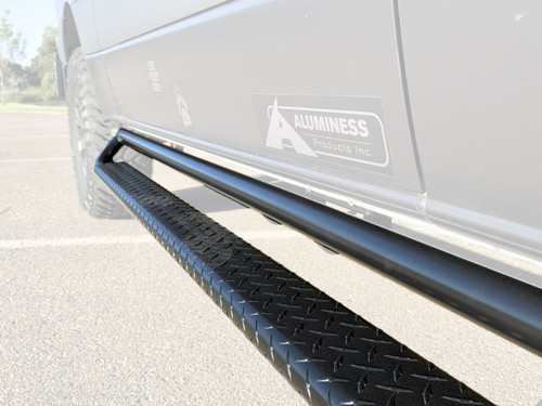 Close-up picture highlighting an Aluminess Nerf Bar for Mercedes Sprinter vans.