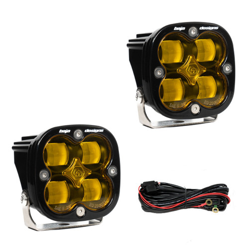 Set of Baja Designs Squadron Sport SAE lights with amber lenses and wiring kit.
