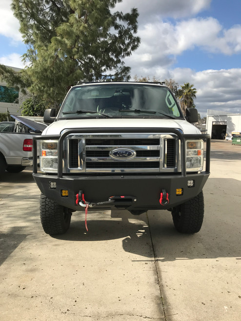 Front winch bumper on a white 2008+ Ford E-Series van.