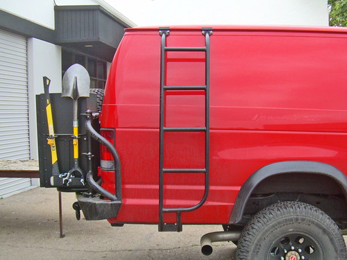 Red Ford E-Series van equipped with a black side ladder.