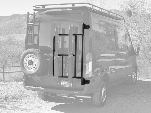 A black Ford Transit van with a vertical mount rear door bike rack from Aluminess Products.