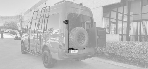 Rear door view of a grey Mercedes Sprinter van featuring Aluminess Rear Door Box/Tire Rack.